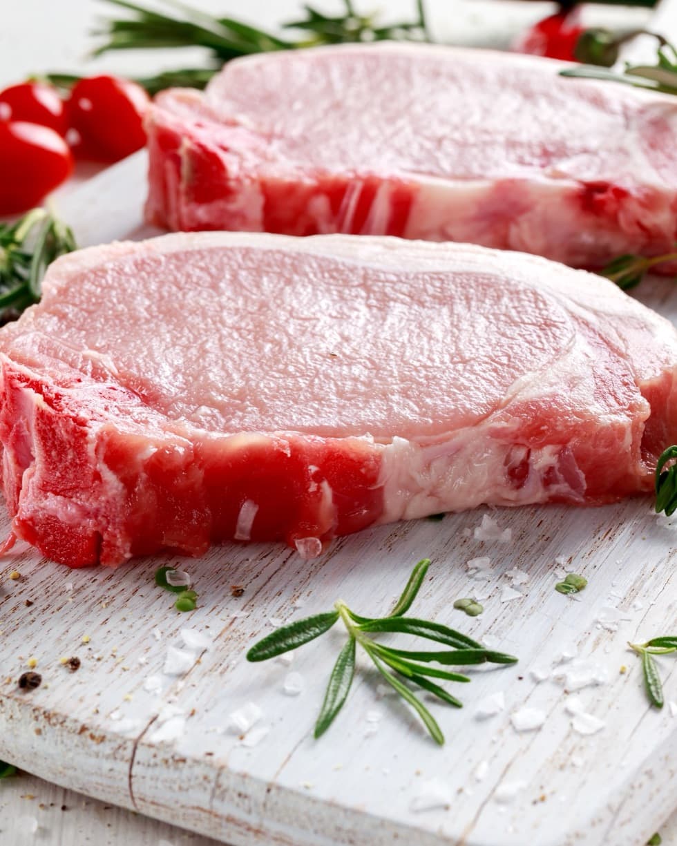 Raw premium Canadian pork loin with rosemary