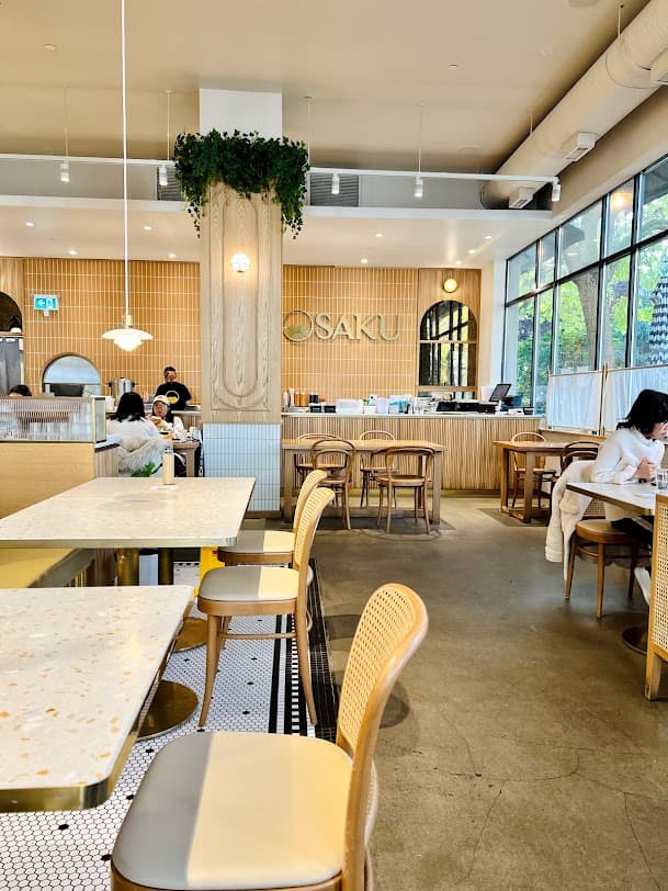People sitting and eating inside a restaurant